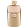 gucci perfume bottle with a metallic gold and peach design
