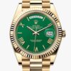 rolex oyster perpetual day date yellow gold with a green dial