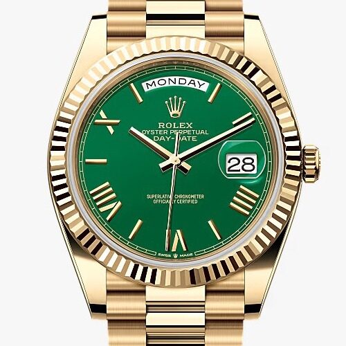 rolex oyster perpetual day date yellow gold with a green dial