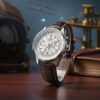 breitling watch with a silver dial and brown leather strap breitling watch with a silver dial and brown leather strap