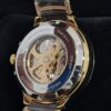 rado watch with a gold and black design