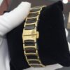 rado watch with a gold and black design