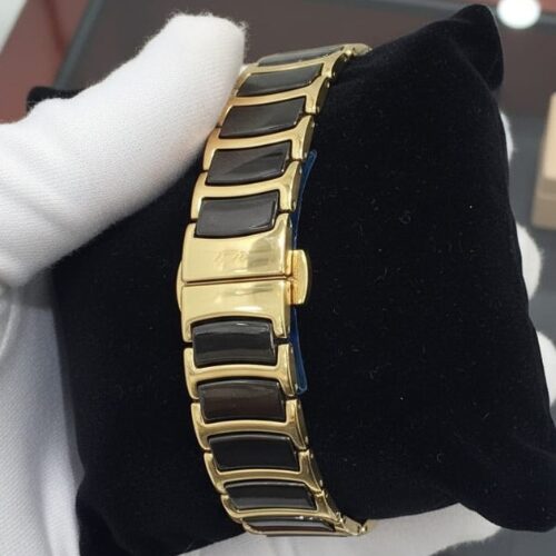 rado watch with a gold and black design