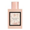 gucci flora perfume in creamy peach with striking orange blossom accents
